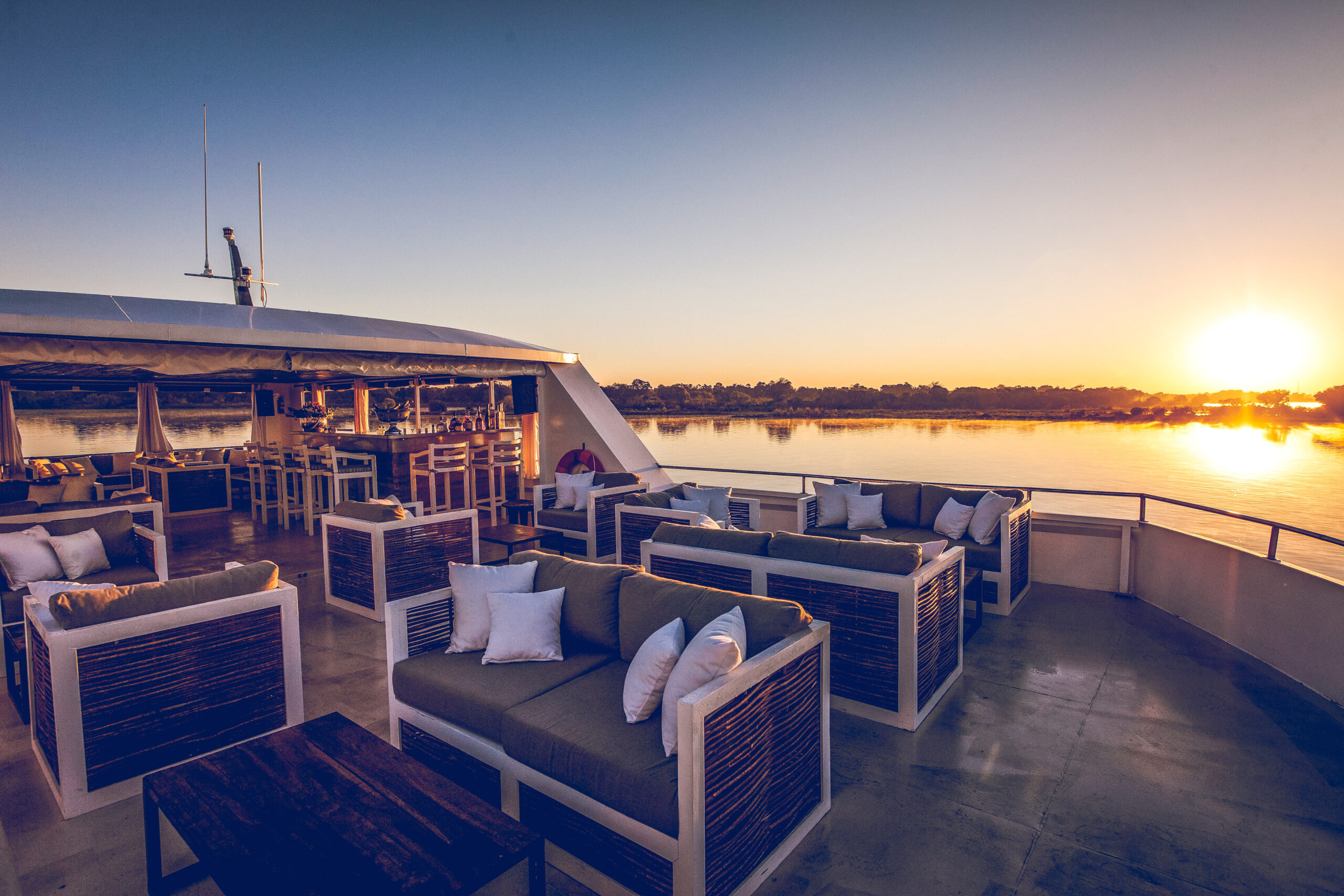 Uber luxury on the Signature deck sunset cruise on the Zambezi River in Victoria Falls, Zimbabwe